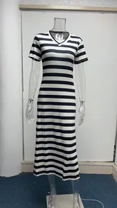 Full length view of a summer women's black and white striped V-neck short sleeve maxi dress