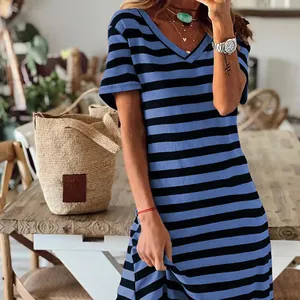 Detail view of the blue and black striped pattern on a casual V-neck summer dress