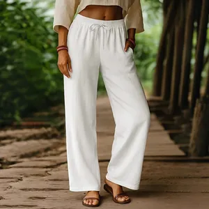 Casual women's white cotton linen wide-leg pants featuring a comfortable elastic drawstring waist