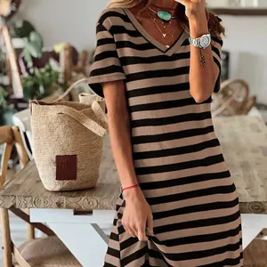 Casual summer V-neck striped dress featuring a loose fit and stylish side slit