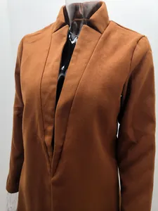 Close-up detail of brown standing collar woolen coat with premium textured fabric finish