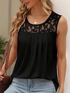 Detail of black sleeveless top featuring elegant lace neckline and pleated chest design.