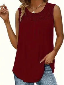 Close-up detail of burgundy sleeveless top featuring lace neckline and pleated front design
