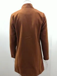 Back view detail of the brown woolen fabric and minimalist tailoring of the stand collar coat