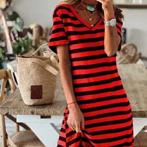 Detailed close-up showing the vibrant red and black striped summer casual V-neck dress