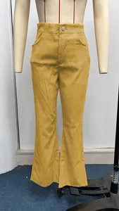 High-waisted mustard yellow corduroy flared trousers for women in a classic autumn style