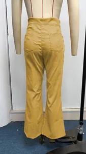 Back view of yellow corduroy flared pants with high waist and back pockets detail