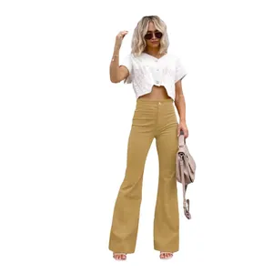 Fashionable camel corduroy high waist flare trousers for women on white background