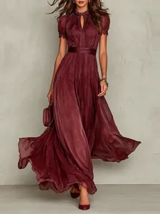 Elegant burgundy maxi dress with high neck keyhole and flowy pleated skirt for summer