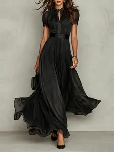 Elegant black V-neck maxi dress with lace trim and cinched waist for spring summer