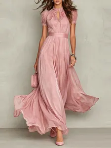 Elegant pink V-neck maxi dress with waisted design and flowing large swing hem for women