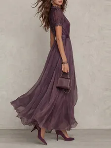 Elegant plum purple flowing maxi dress with V-neck and short sleeves for summer