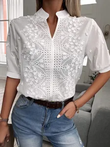 White V-neck stand collar blouse with floral embroidery and lace details for women