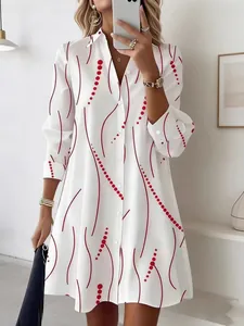 Elegant white shirt dress for women featuring chic red polka dot and wave patterns