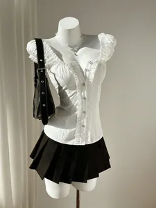 Elegant white short sleeve blouse with bubble sleeves and ruffled details for a sweet look