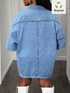 Back view of a loose light blue denim vest for women showing quality stitching details