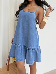 Beautiful summer denim mini dress with thin straps and a stylish ruffle hem detail