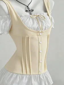 Detailed macro view of vintage beige corset vest over white ruffled off-shoulder blouse