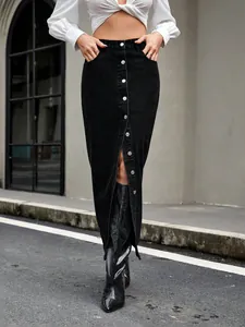 Close-up of vintage black denim midi skirt with front buttons and stylish slit