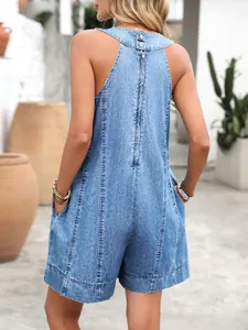 Detailed back view of a stylish casual blue denim halter romper featuring zipper and pockets