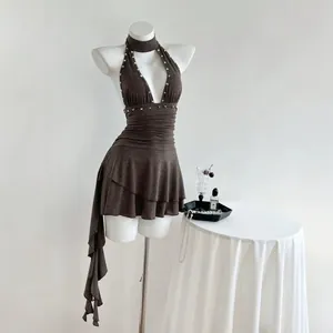 Sexy dark brown halter neck sleeveless dress with silver studs and ruffle hem design.