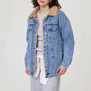 Classic women's loose denim jacket featuring warm brown sherpa lining and collar details