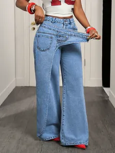 Detailed view of trendy wide-leg denim jeans with an asymmetrical crossover waist design