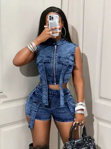 Sexy two-piece denim set featuring a sleeveless zip-up vest and matching acid-washed shorts