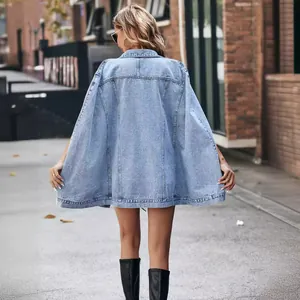 Fashionable light blue denim cape jacket featuring a loose fit and irregular hemline