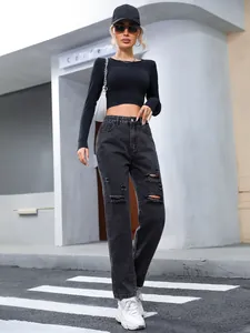 Womens high waisted ripped straight leg black denim jeans in casual street style look