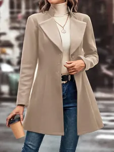 Detailed view of a stylish beige lapel wool coat for women in an urban street setting.