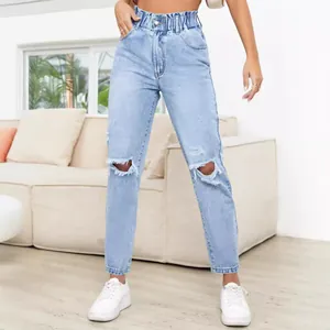 Trendy light blue ripped straight leg jeans for women featuring a stylish paperbag waist.
