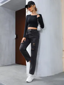 Stylish women's high-waisted black ripped jeans featuring distressed denim details