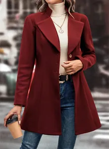 Close-up of elegant burgundy lapel wool coat for women in a chic urban setting