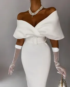 Close-up of elegant white off-shoulder bodycon dress with belt and mesh gloves