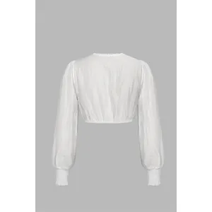 Back view of white sheer Oktoberfest dirndl blouse with long puff sleeves and lace