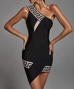 Detailed view of the black bandage dress featuring the cream Greek key jacquard pattern