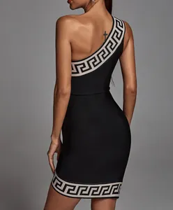 Close-up of a black one-shoulder bandage dress with a Greek key jacquard pattern border