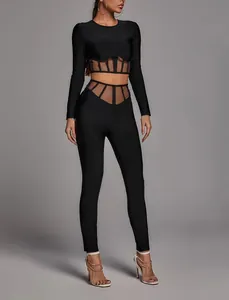 Ensemble chic deux pièces noir à manches longues avec panneaux en mesh et taille haute