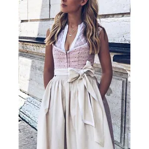 Elegant German Oktoberfest Dirndl dress with pink floral bodice and beige bow skirt.