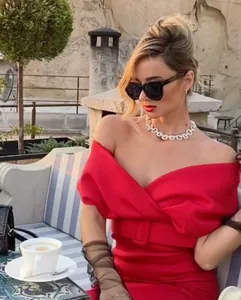 Elegant red off-shoulder scuba dress with belt, showcasing premium fabric texture and fit.