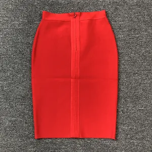 Detailed view of the back zipper and ribbed fabric on a red bandage pencil skirt