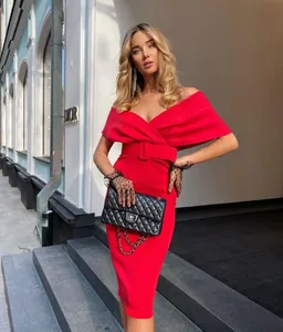 Elegant red off-the-shoulder bodycon dress with matching belt and sleek silhouette