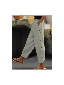 Elegant women's casual striped trousers with unique side button detailing for autumn style