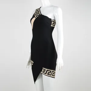 One-shoulder black bandage dress with jacquard Greek key pattern on mannequin