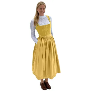 Elegant yellow vintage German Oktoberfest Dirndl dress with white lace blouse detail