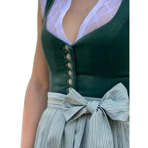 Traditional German Oktoberfest Dirndl dress with green velvet bodice and lace blouse