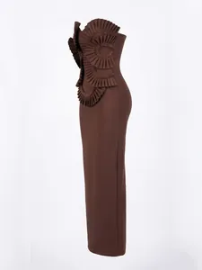 Side view of chocolate brown bandage maxi dress with ruffled bust and handmade beading