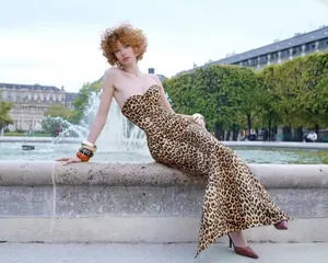 Elegant leopard print strapless midi dress for women in a professional outdoor setting