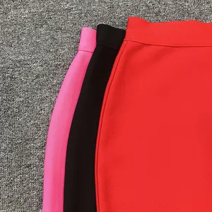 Close-up detail of high-elastic bandage bodycon pencil skirts in red, black and pink